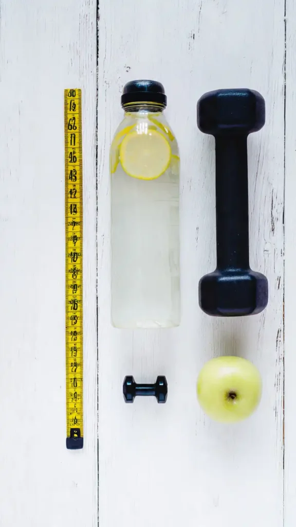 Quel Sport pour Perdre du Ventre ? Mon Guide Ultime pour une Taille Affinée et Tonique 2 flat lay photography of fitness essentials a